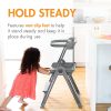 Child using Pivot Toddler Tower with non-slip feet for stability.