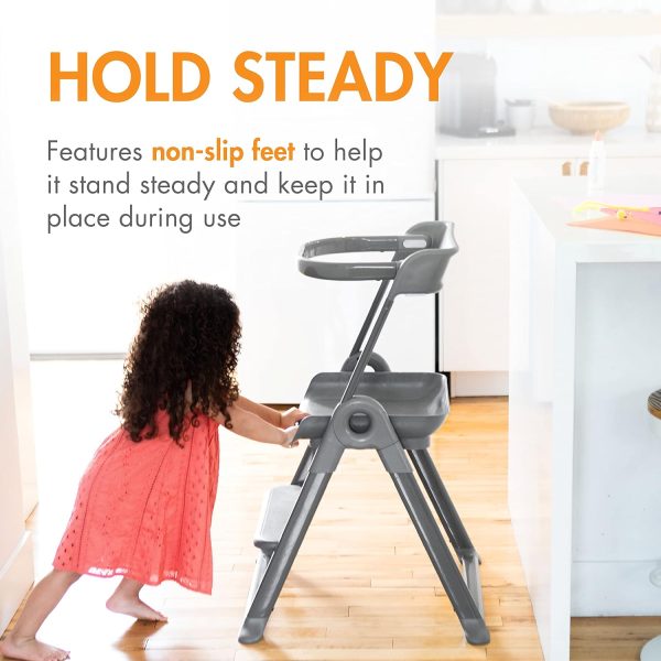 Child using Pivot Toddler Tower with non-slip feet for stability.