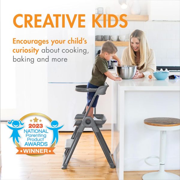Mother and child cooking together using Pivot Toddler Tower.