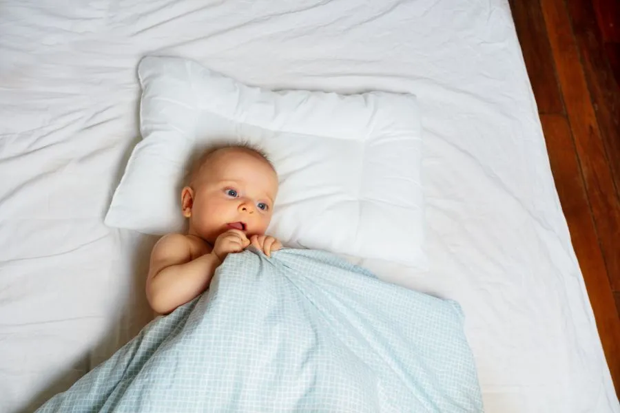 Waking up babies to maintain their bedtime.