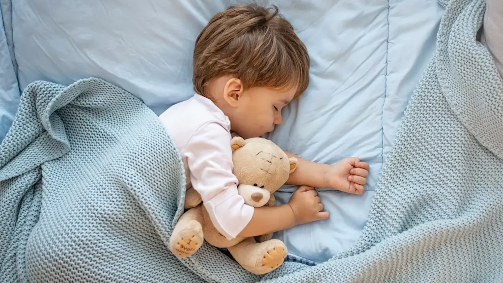 Use a waterproof bedsheet to prevent your child from bedwetting