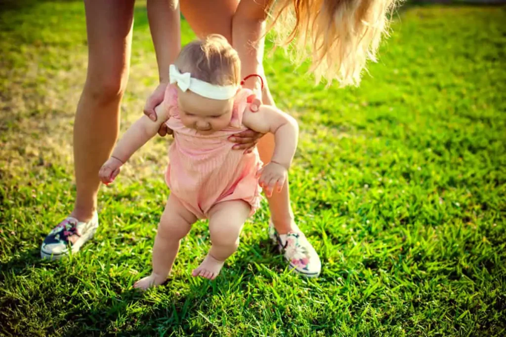 Most babies begin walking between the ages of 9 and 18 months