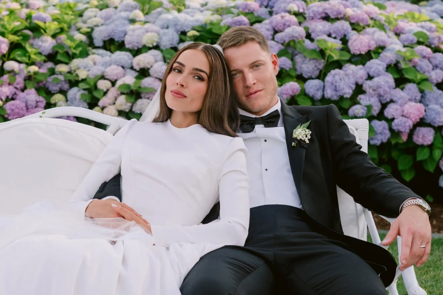 Olivia Culpo (left) and Christian McCaffrey